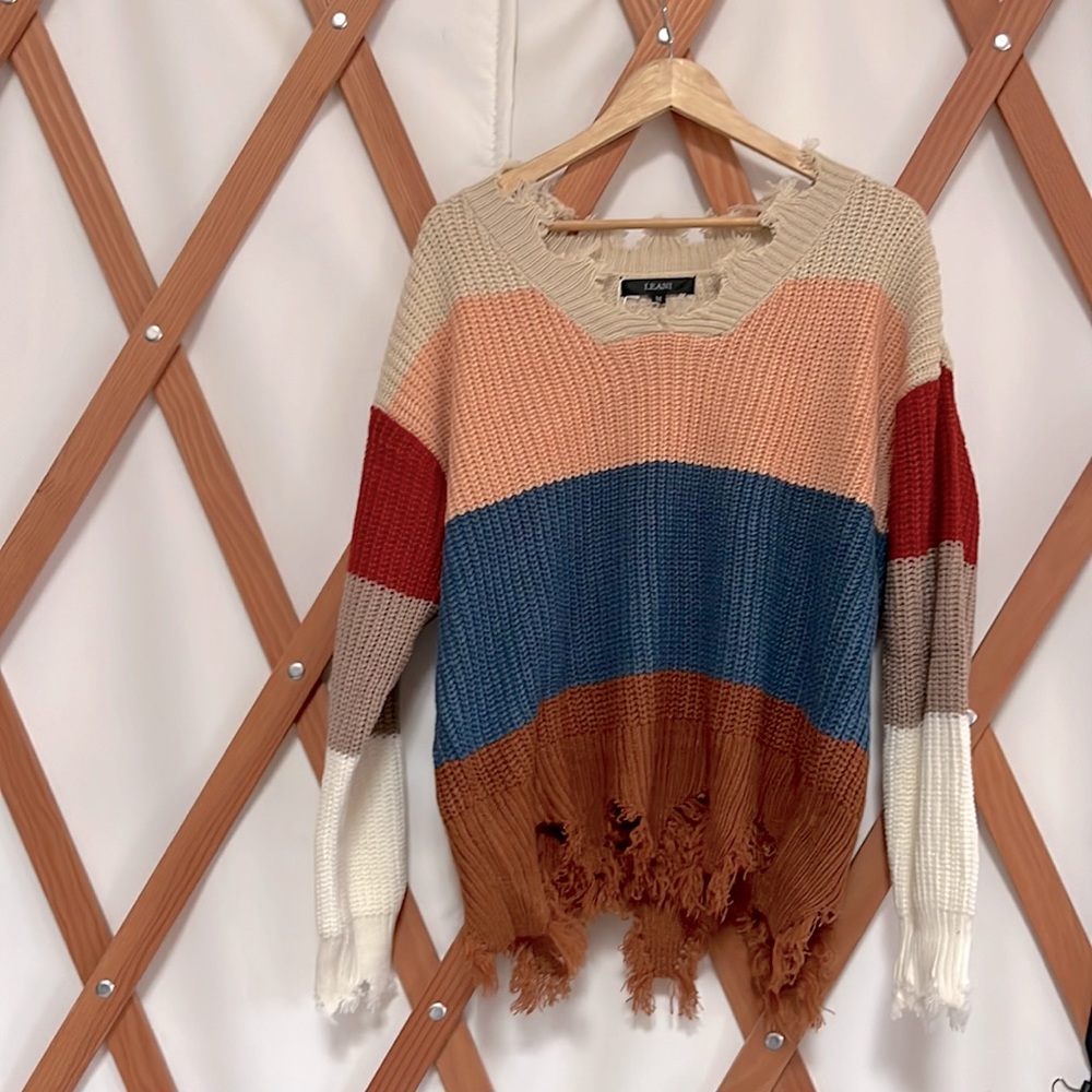 Leani loose knitted sweater. NWT size medium, purposefully distressed.